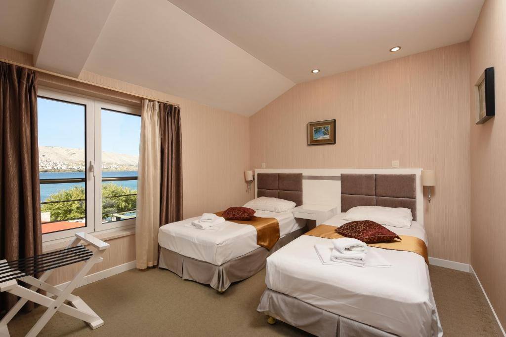 Room at Family Hotel Zanè in Pag 3